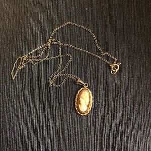 VINTAGE (kids?) gold necklace with carved pendant